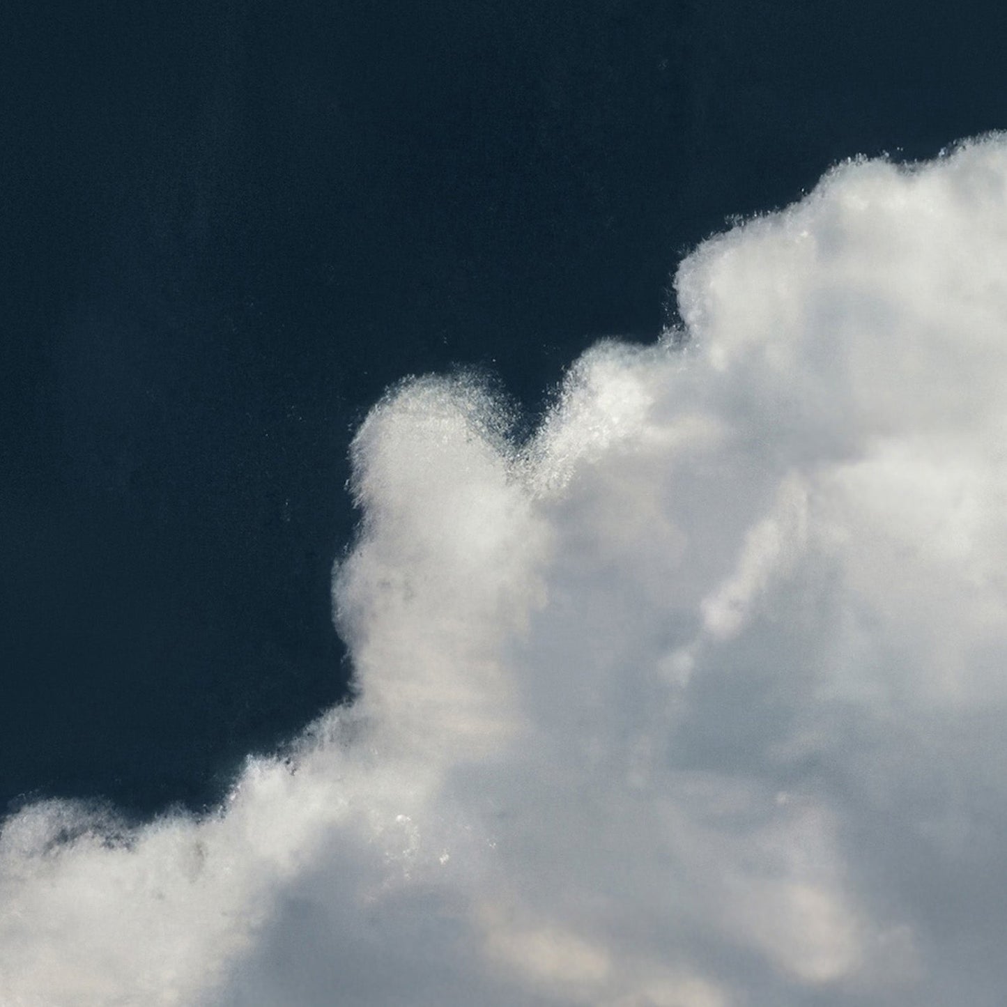 Extreme Close Up Detail Of Fluffy Cloud · Blue