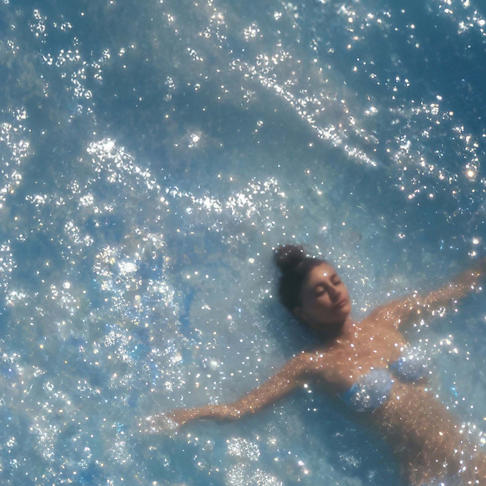 Extreme Close Up Detail Of Swimmer In Ocean