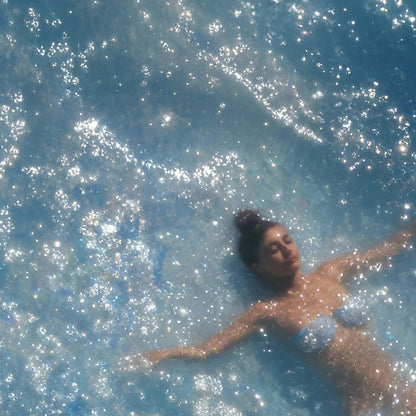 Extreme Close Up Detail Of Swimmer In Ocean